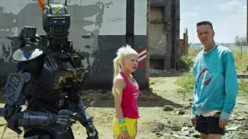The blue sweater printed dolphins of Ninja (Watkin Tudor Jones) in Chappie