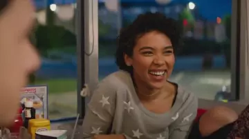 Grey pullover with white stars worn by Abby Suso (Alexandra Shipp) as seen in Love, Simon