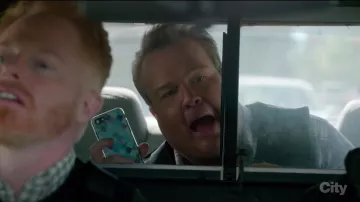 The blue hull of Cameron Tucker (Eric Stonestreet) in Modern Family S09E19