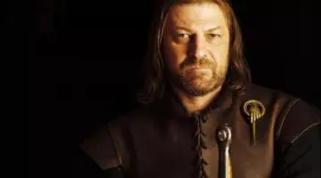 The badge of the Hand of the King Ned Stark (Sean Bean) in Game of Thrones