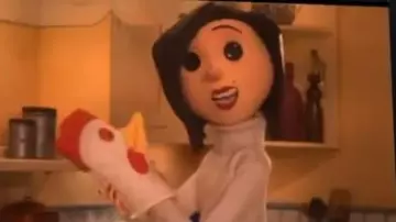 The replica plush of the other mother of Coraline in the animated film Coraline