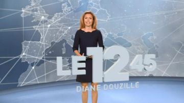 La robe marine col bateau festonné de Diane Douzillé dans Le 12:45 de M6 du 23/04/2018