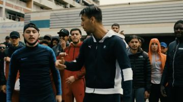 La veste de survêtement à capuche Puma x BMW portée par YL dans le clip Ma zone feat. MRC