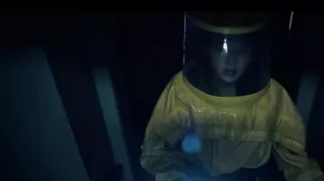 Hazmat suit en­cap­su­lated worn by Simone (Alba August) as seen in The Rain S01E01