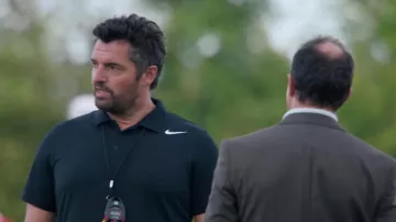 The Nike polo black Vincent Barteau (Arnaud Ducret) in Mr. I-know-it-all