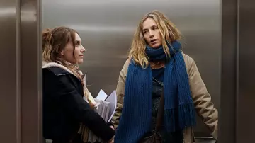 The blue scraf worn by Cecile de France as seen in Call my agent S01E01