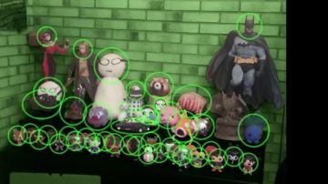 The figurine FunKo Pop Superman LinksTheSun in his video "Point Culture : theories of fan to the cinema"