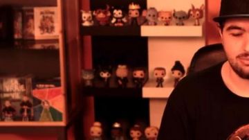 La figura del gato Funko Pop Cheshire en el video de YouTube Las nuevas aventuras de Aladdin - 50/50 (revisión) de LinksTheSun