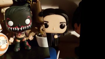 The figurine FunKo Pop Finn Balor of LinksTheSun in his youtube video "The Point - March 2018"