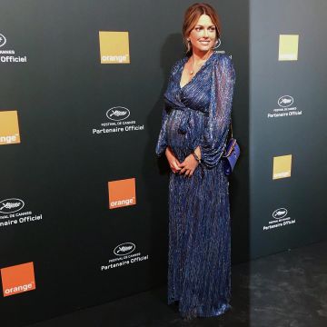 The Dress blue long fabric iridescent and back naked, Caroline Receveur at the Cannes film Festival