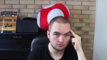 The stuffed Mushroom Mario in the YouTube video Madame Pavoshko - Black M (critique) of LinksTheSun