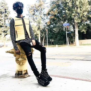 The pair of Nike Air More Uptempo '96 Black Scarlxrd on his account Instagram