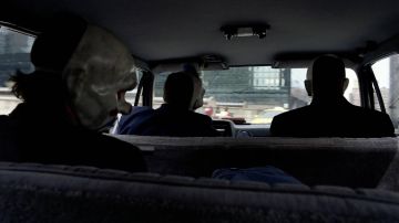 The masks of the clown henchmen of the Joker (Heath Ledger) in The Dark Knight : The Black knight