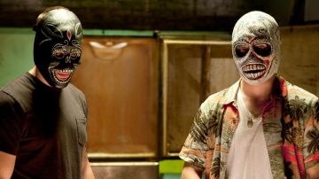 The masks of Wrestler Ben (Aaron Taylor-Johnson) and Chon (Taylor Kitsch in Savages