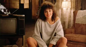 Le pull de Alex Owens (Jennifer Beals) dans Flashdance