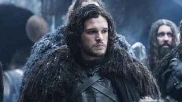 The skin of a beast, and cape of Jon Snow (Kit Harington) in Game of Thrones (The iron throne)