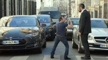 THE Tesla Model S in A man to the height