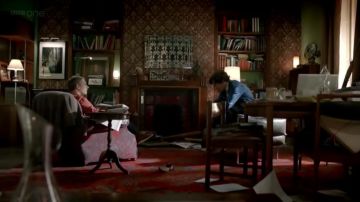 The mirror is vintage, in the apartment of Sherlock Holmes (Benedict Cumberbatch) in Sherlock