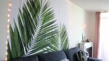 The tapestry palm leaves of Kalyn Nicholson in his video "Summer Try-On Haul | Clothes, Decor + Books"