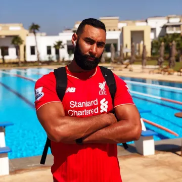 The red t-shirt, LFC (Liverpool Football Club) worn by LaFouine on his account Instagram