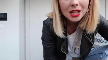 The necklace with round pendant and gold diamond patterned triangle and arrow Zoella (Zoe Suggested) on his Youtube channel MoreZoella