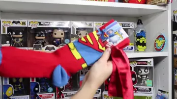 The socks Superman with a cape in the youtube video, Our collection of products derived from Fancy Fanny