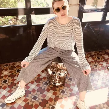 Les sneakers Converse montantes blanches de Emma Roberts sur son compte Instagram