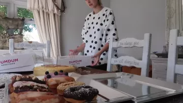 The sweater polka dot black Zoella (Zoe Suggested) seen in his video "PRIMARK SHOPPING AND GRANDADS 80TH BIRTHDAY"