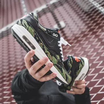The nike air max 1 atmos black and green on the account instagram @tadsnkrs