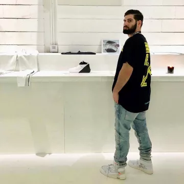 The pair of Air Jordan x Off White Nike AJ I 1 The Ten Part II White door Qias Omar on his post Instagram