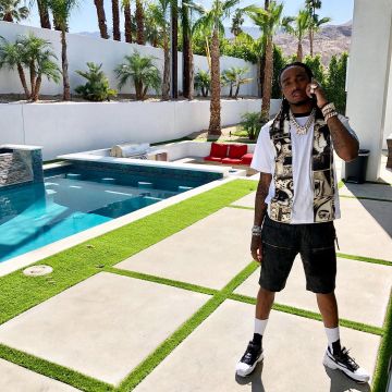 The pair of Adidas raf simon Ozweego Replicant III white door Quavo on his account Instagram