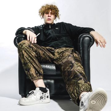 Les sneakers blanches Supreme x Comme des Garçons x Nike Air Force 1 de Sirap sur son compte Instagram