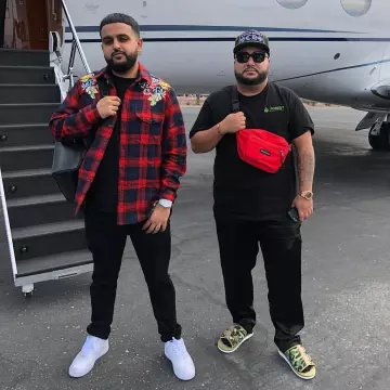 La paire de air force one que porte Nav sur son post Instagram