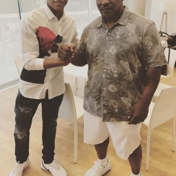 The sneaker display Nike x Skepta Air Max 97/BW scope by Kylian Mbappé with Mike Tyson on Instagram