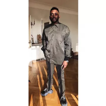 Mac Tyer en ntuch and with his sneakers Balenciaga Triple S Triple Black (2018 Reissue) views on instagram