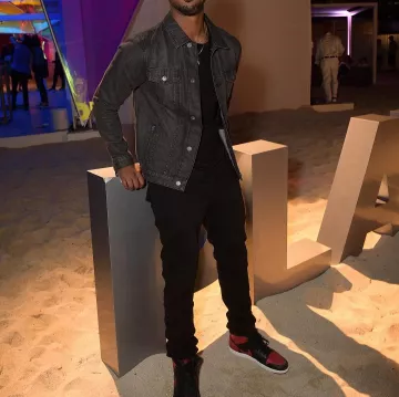 The pair of Nike Air Jordan 1 Retro High OG Banned Bred Black Varsity Red worn by Michael B. Jordan on his account Instagram