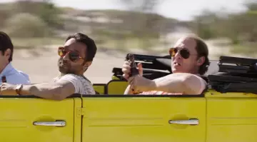 Les lunettes de soleil Ray-Ban Aviator de Kenny Wells (Matthew McConaughey) dans Gold