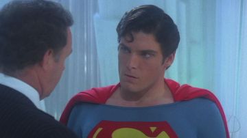 An authentic part of the red cape of Superman worn by Christopher Reeve in Superman