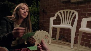 Le jeu de cartes Happy families (7 familles) dans It Follows