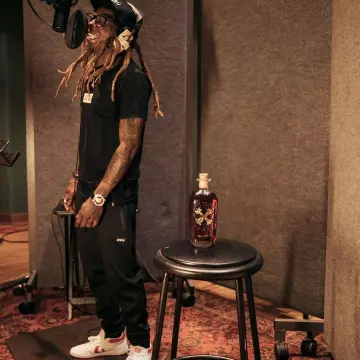 Les sneakers Converse Pro Leather Think 16 de Lil Wayne sur son compte Instagram
