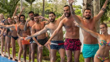 The Tommy Hilfiger swimsuit worn by Anthony in a promotional photo of the show Les Marseillais