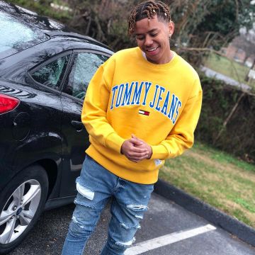 The sweat Tommy Jeans worn by Cordae on his Instagram