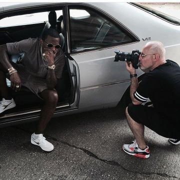 The nike airmax 90 red black grey of Fabolous on his account Instagram