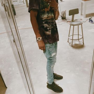 The pair of the Adidas Yeezy Boost 350 Pirate Black Travis Scott on Instagram