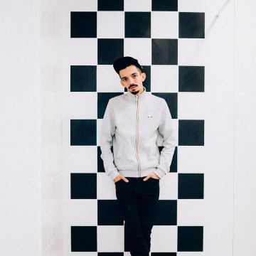 The vest grey le coq sportif, BigFlo on his account Instagram