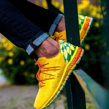 Les Asics Gel Quantum jaune orange de Bisso97120 sur son compte Instagram