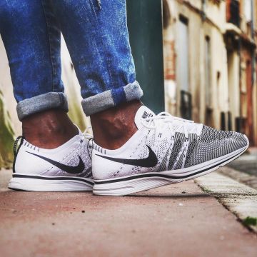 The pair of Nike Flyknit trainer white black view on the post Yoan Kicks on his account Instagram