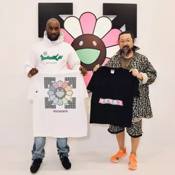 Sneakers orange Nike Zoomfly OffWhite Takashi Murakami at the fondation Louis Vuitton on Instagram