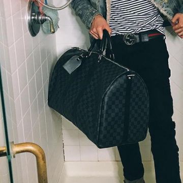 The travel bag checkered Louis Vuitton of Rice on Instagram