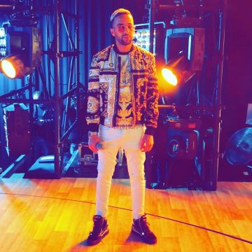 Les sneakers noires Giuseppe Zanotti portées par Naps sur son compte Instagram